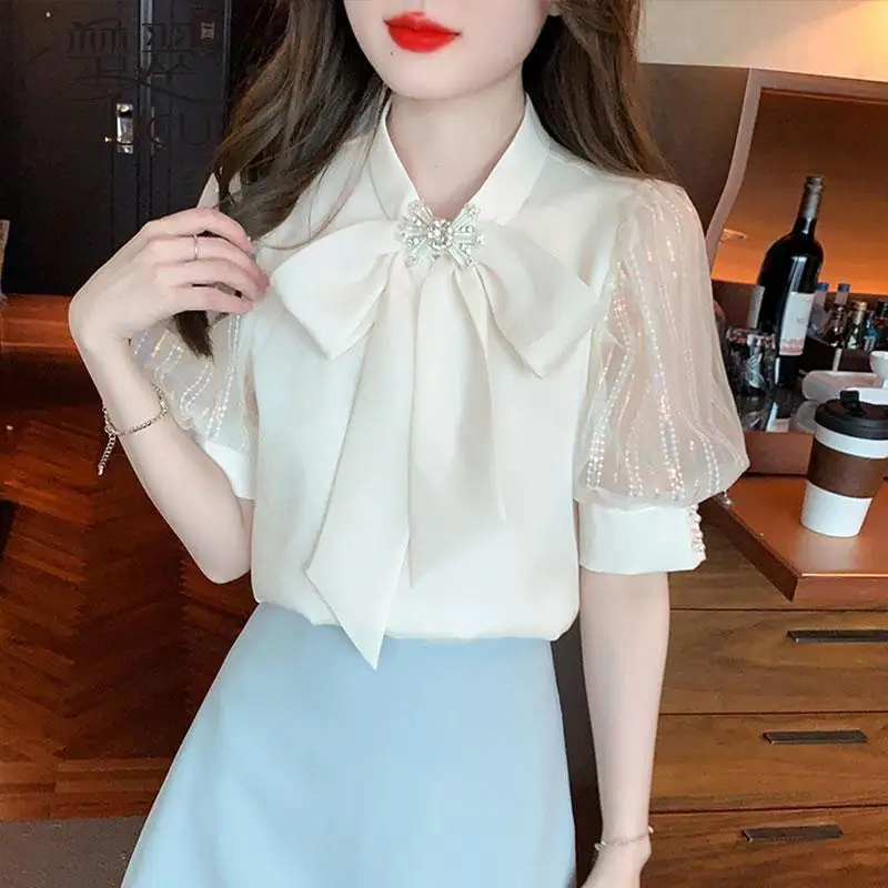 

Темпераментные модные летние новые шифоновые рубашки женские однотонные с v-образным вырезом и бантом с вышивкой расклешенные во французском стиле шикарные свободные топы с пышными рукавами