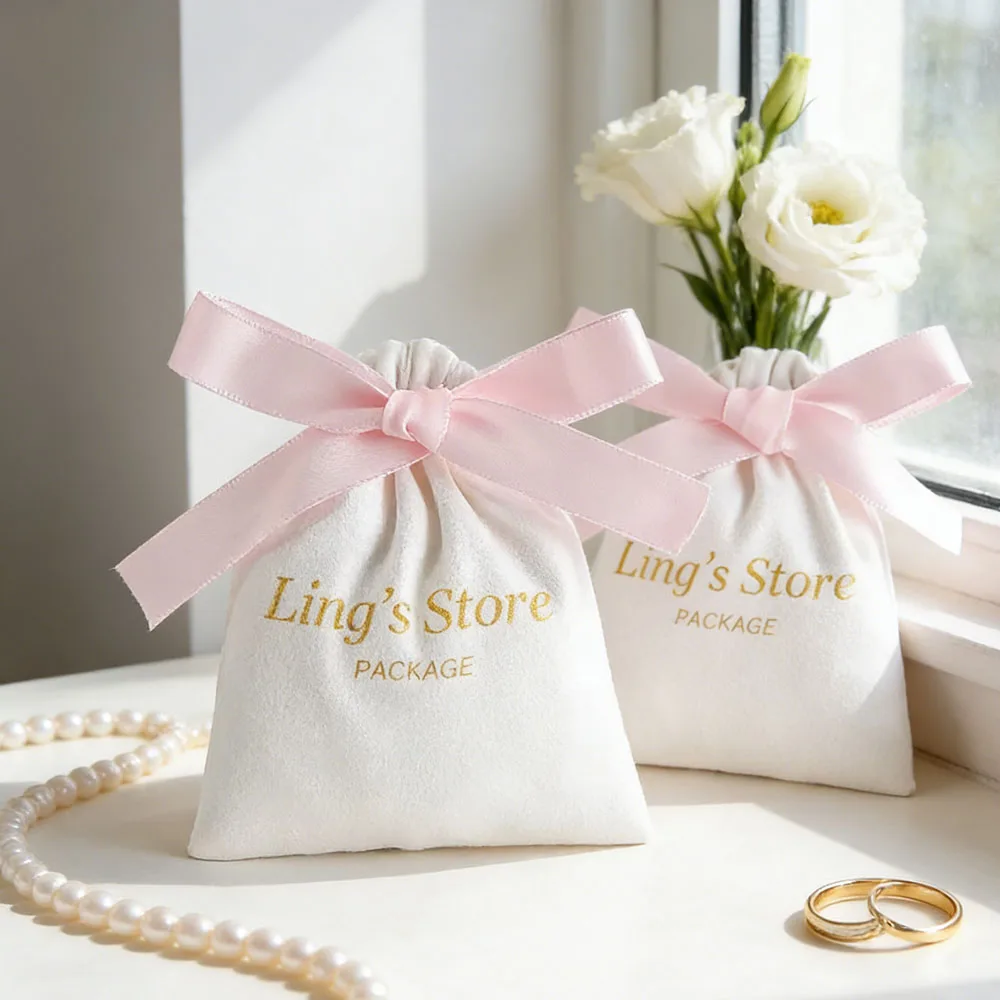 50pcs Custom Logo White Jewelry Flannel Drawstring Bag Back Side with Pink Silk Ribbon Gift Packaging Pouch Wedding Candy Pocket