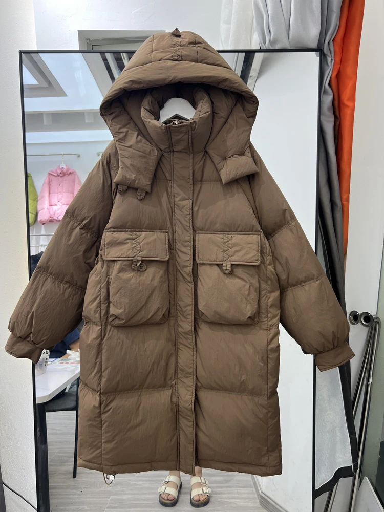 Piumino lungo sopra il ginocchio da donna vestibilità ampia invernale nuova versione coreana addensato versatile casual piumino d'anatra bianco