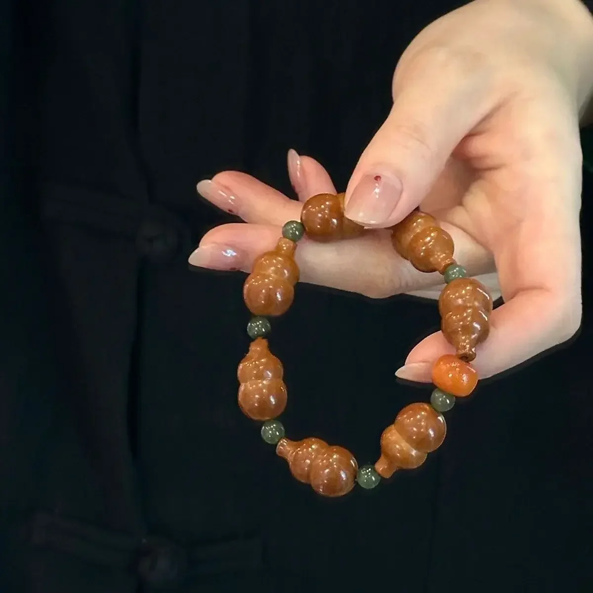 

Olive-core gourd bracelet Fulu double fortune bracelet for men and women Joker national wind Nafu rosary.