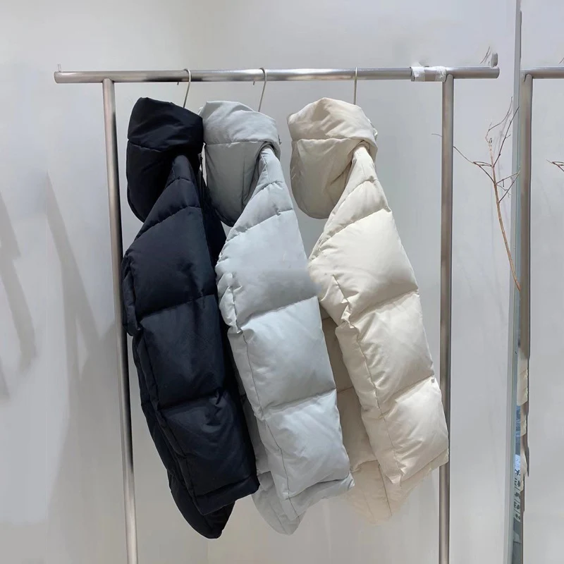 Schinteon المرأة الأبيض بطة أسفل سترة مع غطاء محرك السيارة بسيط الكورية نمط الخريف الشتاء أبلى عارضة فضفاض أكثر من حجم معطف سميك جديد