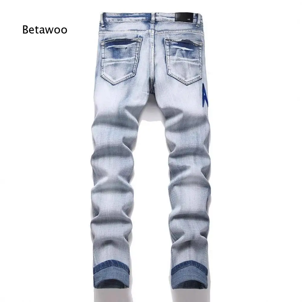 Men Punk Style Blue Denim Pants Slim Fit Stretchy Fabric Ripped Design With Patch And Embroidery Decor Tapered Jeans For Daily