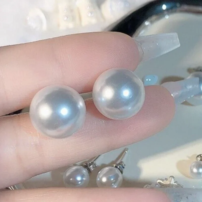 belles-boucles-d'oreilles-surdimensionnees-en-perles-blanches-des-mers-du-sud-rondes-naturelles-aaaaa-12-11mm-925s
