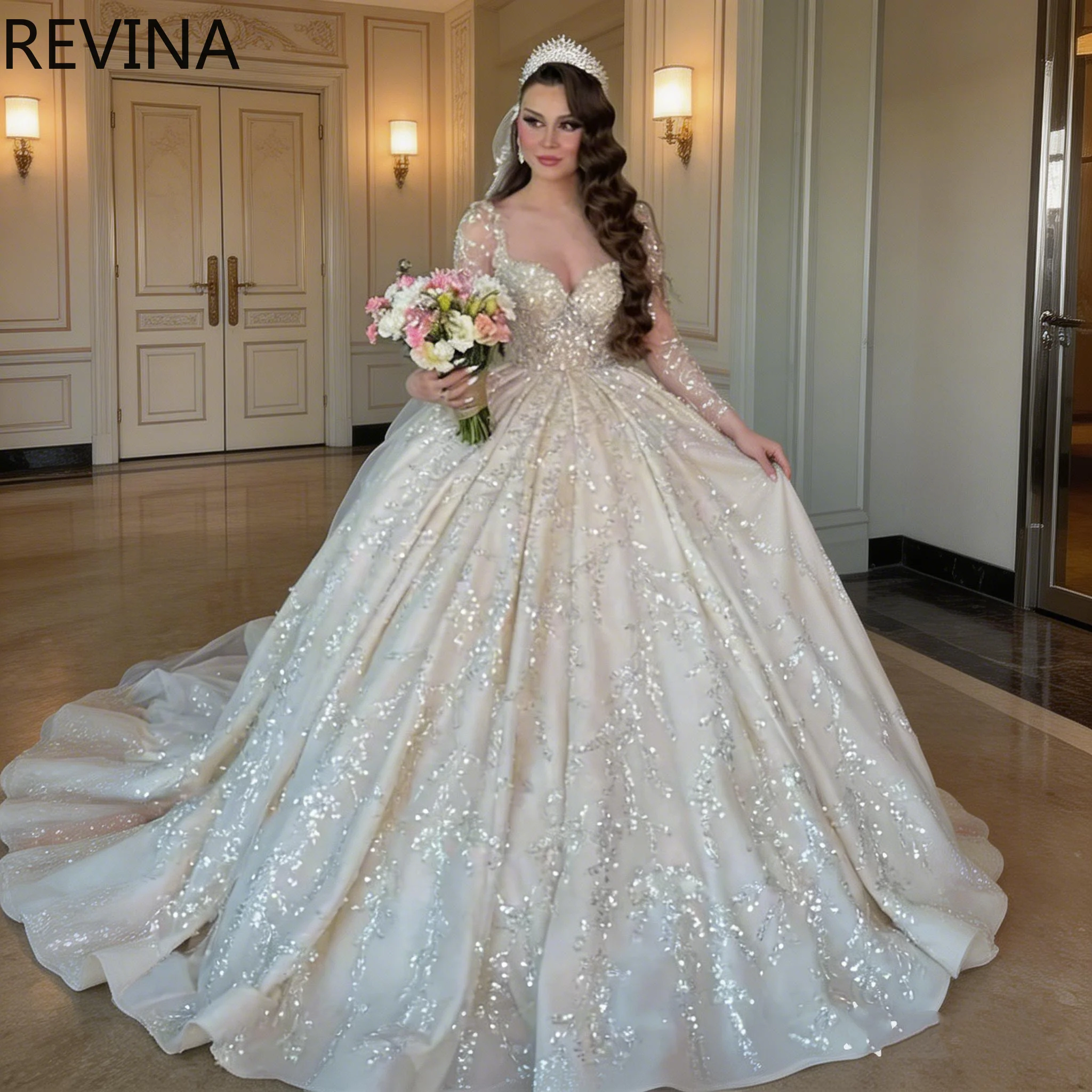

Luxurious Ivory Bridal Ball Gown with Long Sleeves Sparkling Beaded Illusion Waist Customizable Saudi Arabic Wedding Dress
