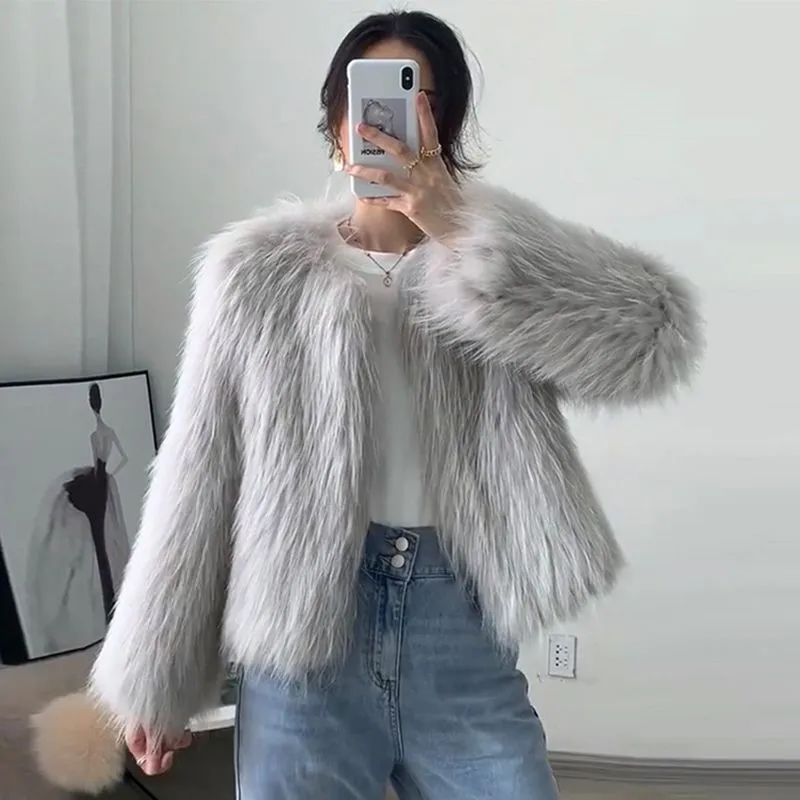 

A new fashionable short fleece fur coat with combination of and small pieces