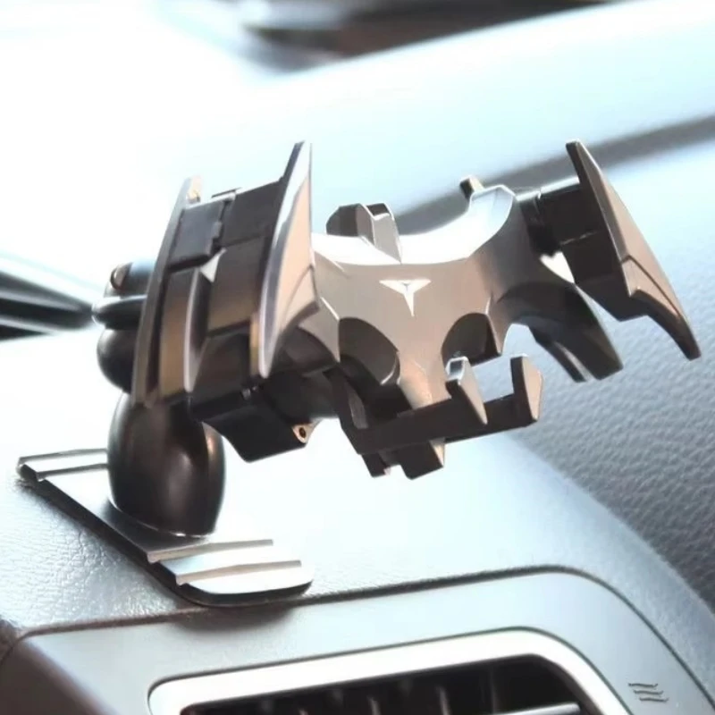 

Hot Arrival Batman Gravity Buckle Type Car Phone Holders Air Outlet Navigation Support Frame Suitable For All 4-6.5 Inch Devices
