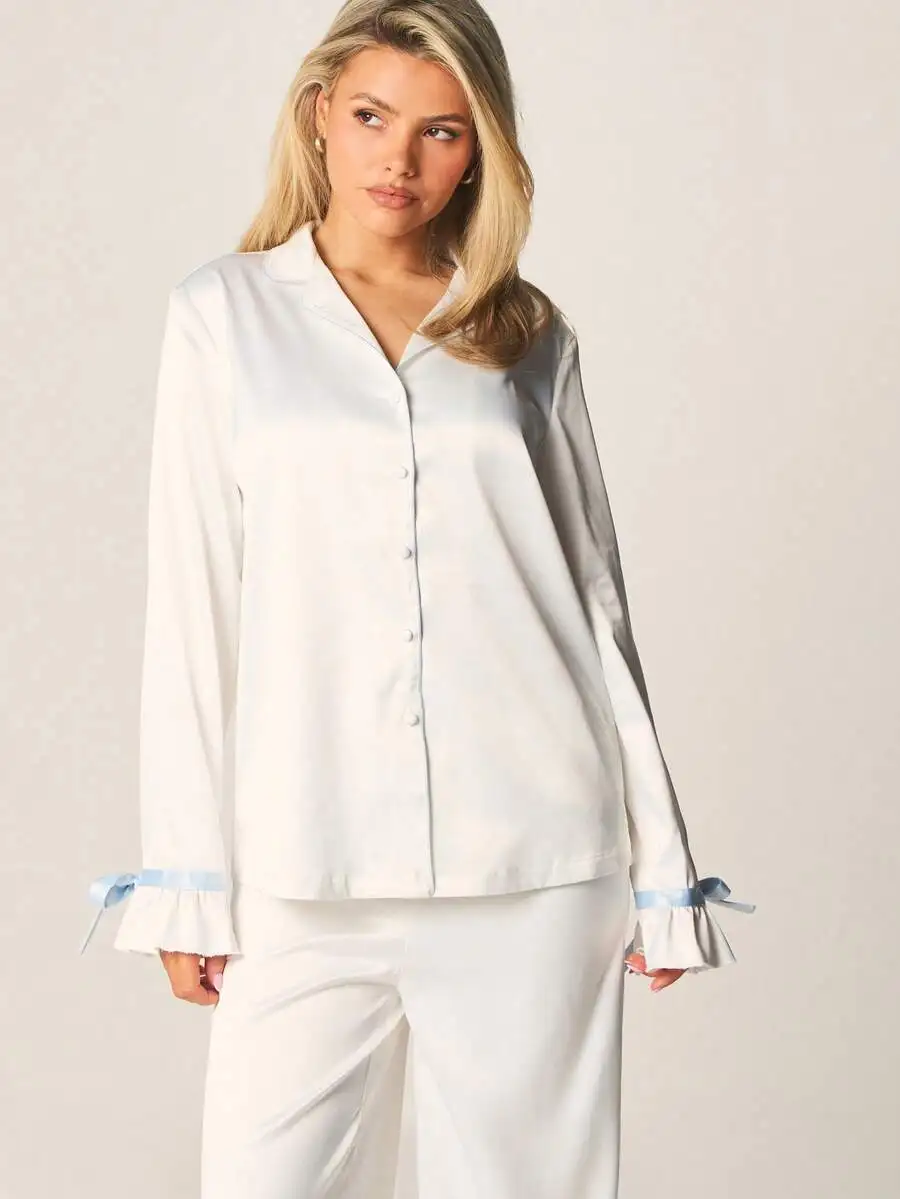

Button Down Pajama Set With Light Blue Bow Sleeve Cuffs And Ruffle Hem Sleep Lounge