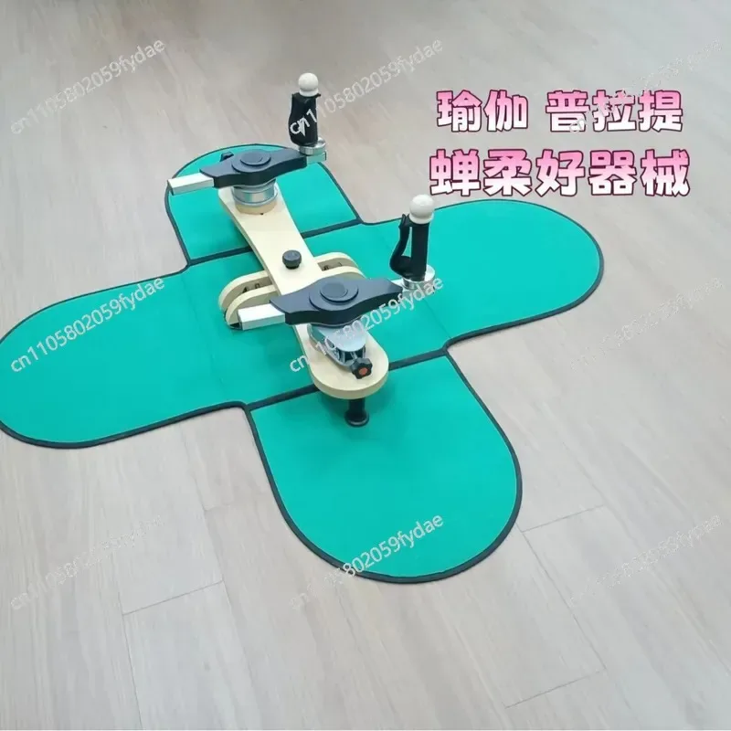 Equipment on The Pulley Tower Spine Gyratory Mat