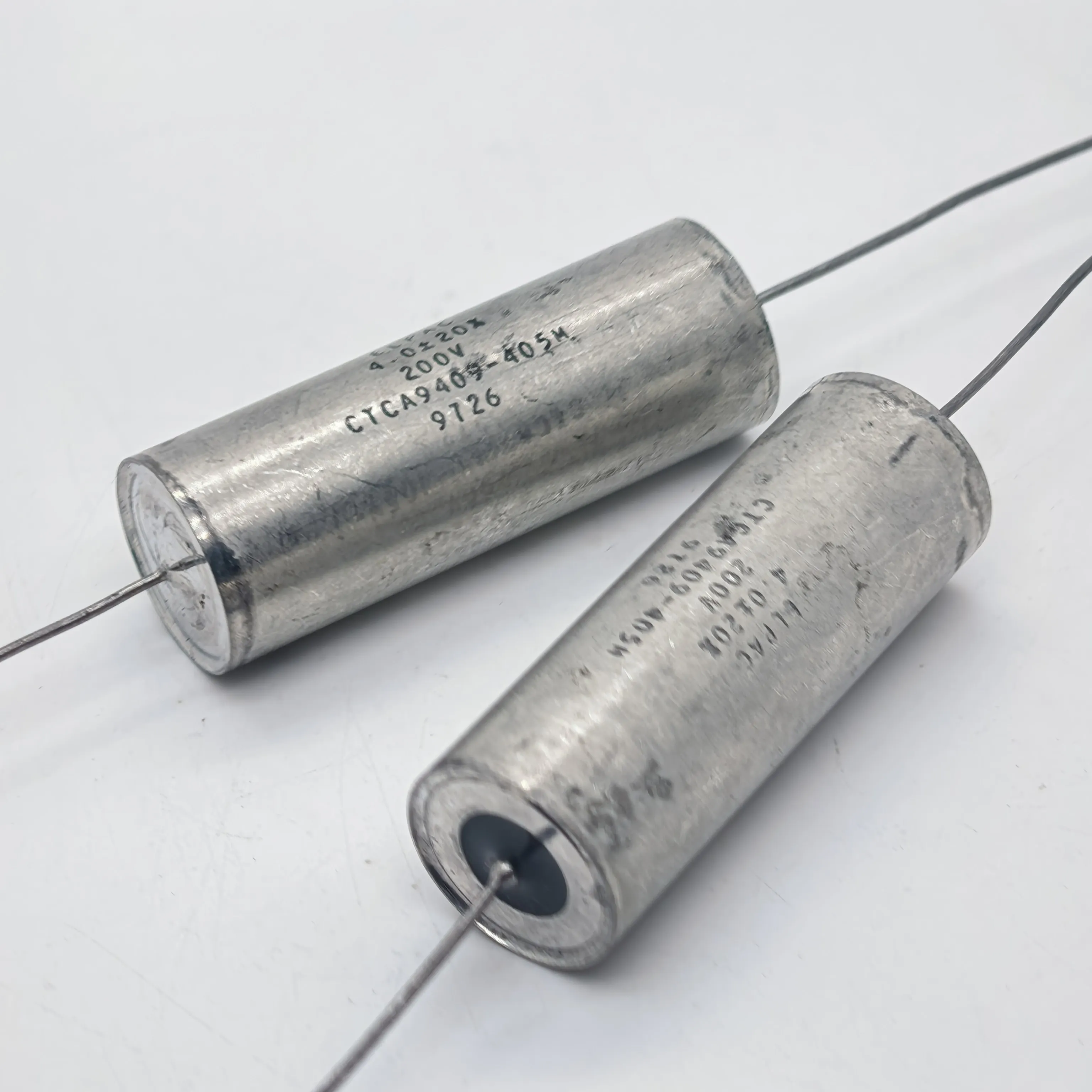 

Американский осевой конденсатор с масляной изоляцией 4UF 200V CTCA9409-405M