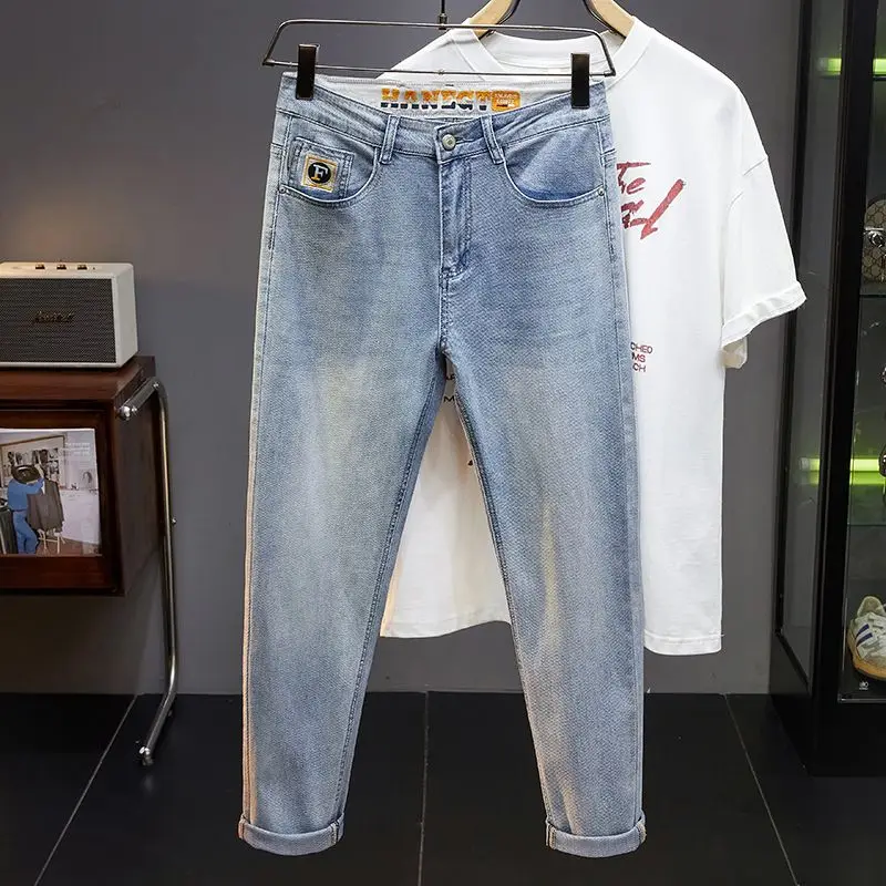 Pantalones vaqueros informales de moda bordados para hombre, pantalón ajustado gris carbón, venta al por mayor, otoño e invierno, novedad