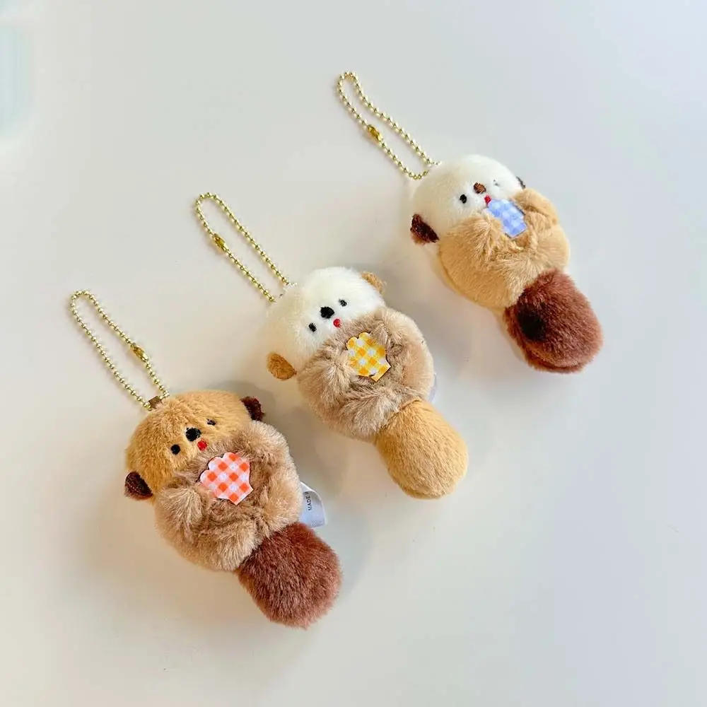 ตุ๊กตาหวาน Otter Hold Shell Key Chain สไตล์เกาหลี Trinket กระเป๋าเป้สะพายหลัง Charms ตุ๊กตาการ์ตูนอะนิเมะ Key แหวนหญิง