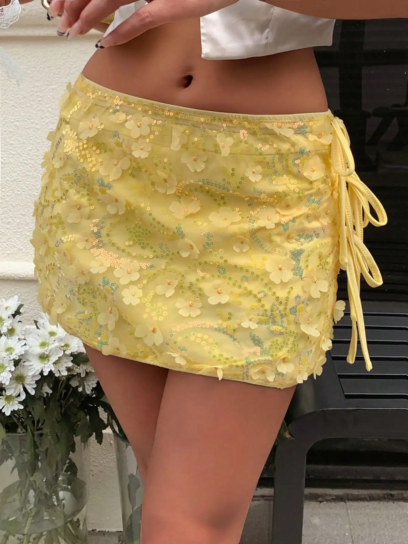 

Yellow Floral Sequin Mini Skirt with Side Tie Waist and Sheer Overlay