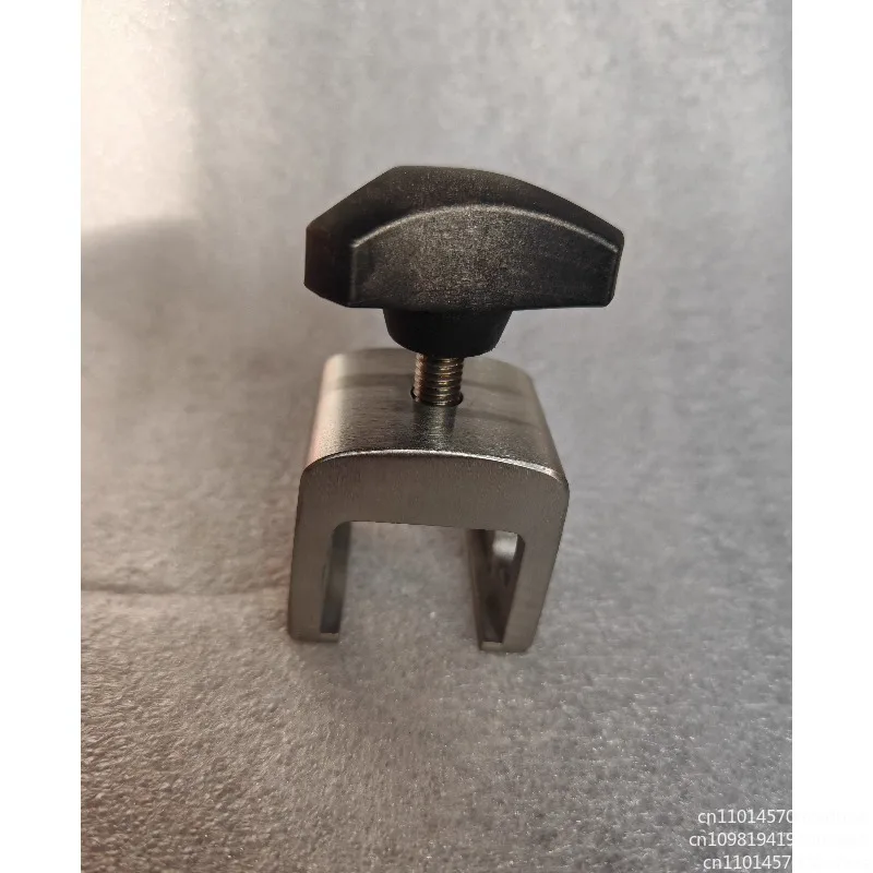 Surgical table accessories, shoulder rests, retainers, rails, acceptors, slides