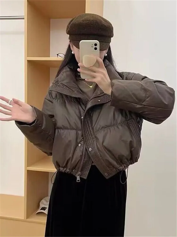

2025 New Women Parkas Winter Warm Loose Puffy Coats Cotton Padded Stand Collar Korean Puffer Jackets Fashion Female Clothes