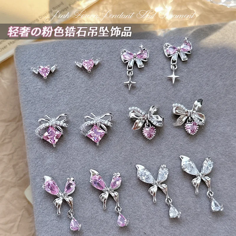 

New Hot Selling Nail Rhinestone Pink Zircon Bow Pendant Jewelry New Light Luxury Silver Butterfly Love Diamond Nail Accessories