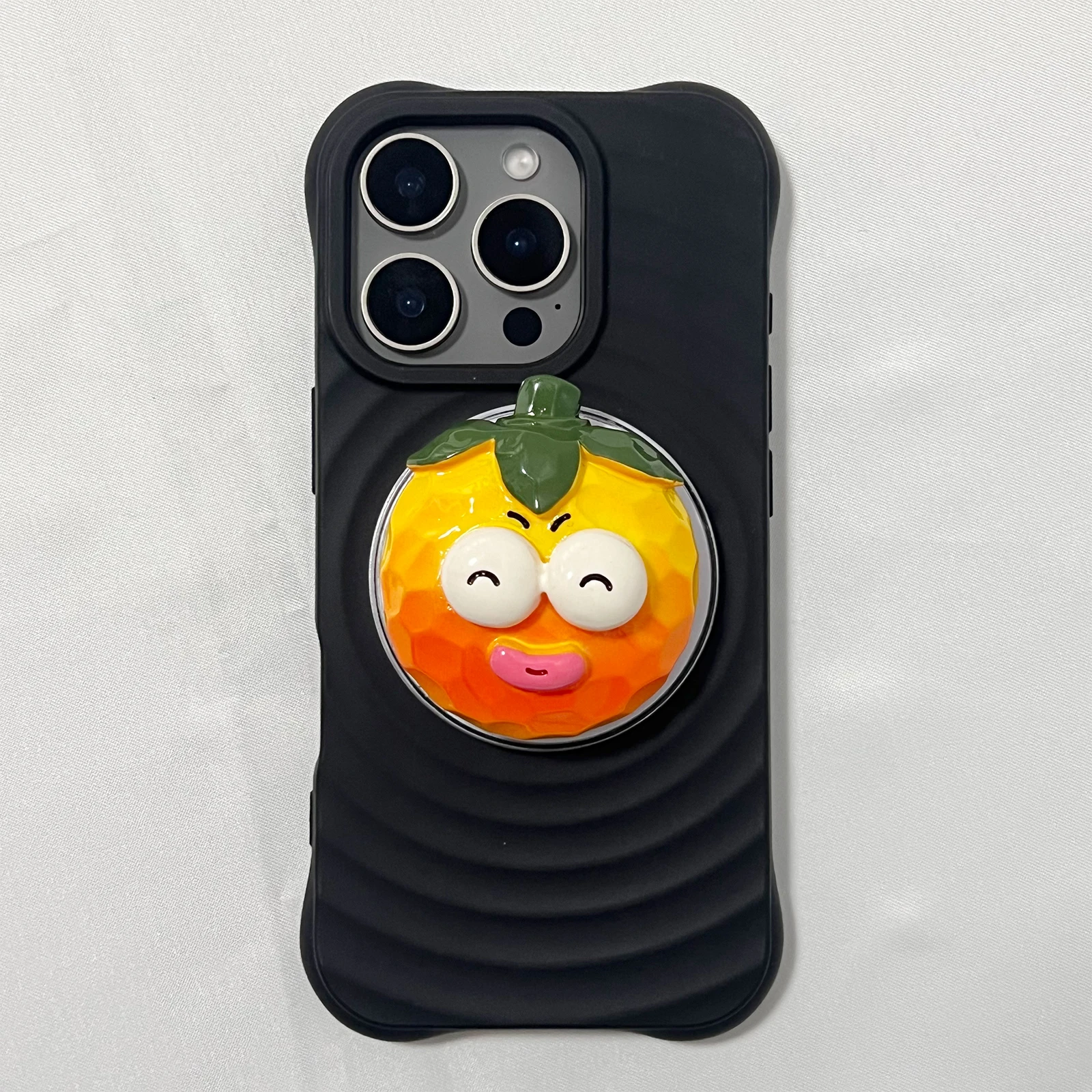 Simpatico supporto per telefono arancione con occhi grandi 3D Griptok Supporto per iPhone 17 16 PM Samsung Grip Tok Socket Staffa regalo per ragazza