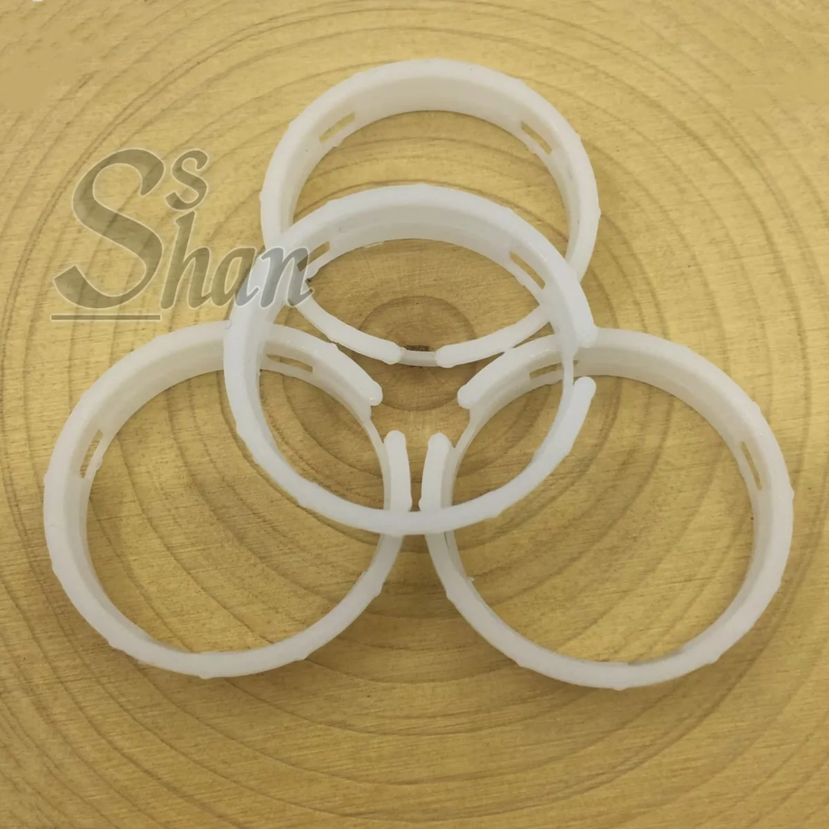 حلقة داخلية بلاستيكية تناسب تركيب الحركة الميكانيكية NH35 NH36 سلسلة NH غطاء داخلي حامل الحركة أجزاء حلقة الإصلاح