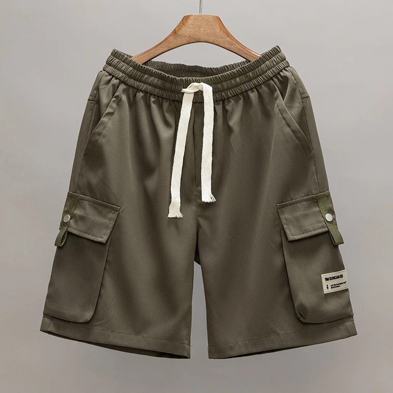 กางเกงขาสั้นทำงานทรงหลวมไซส์ใหญ่พิเศษ 8XL สำหรับผู้ชาย สไตล์เทคแวร์ กางเกงคาร์โก้ กางเกงกอล์ฟผู้ชาย มีกระเป๋าหลายช่อง กางเกงยุทธวิธี กางเกงขาสั้นลำลองฤดูร้อนสำหรับผู้ชาย