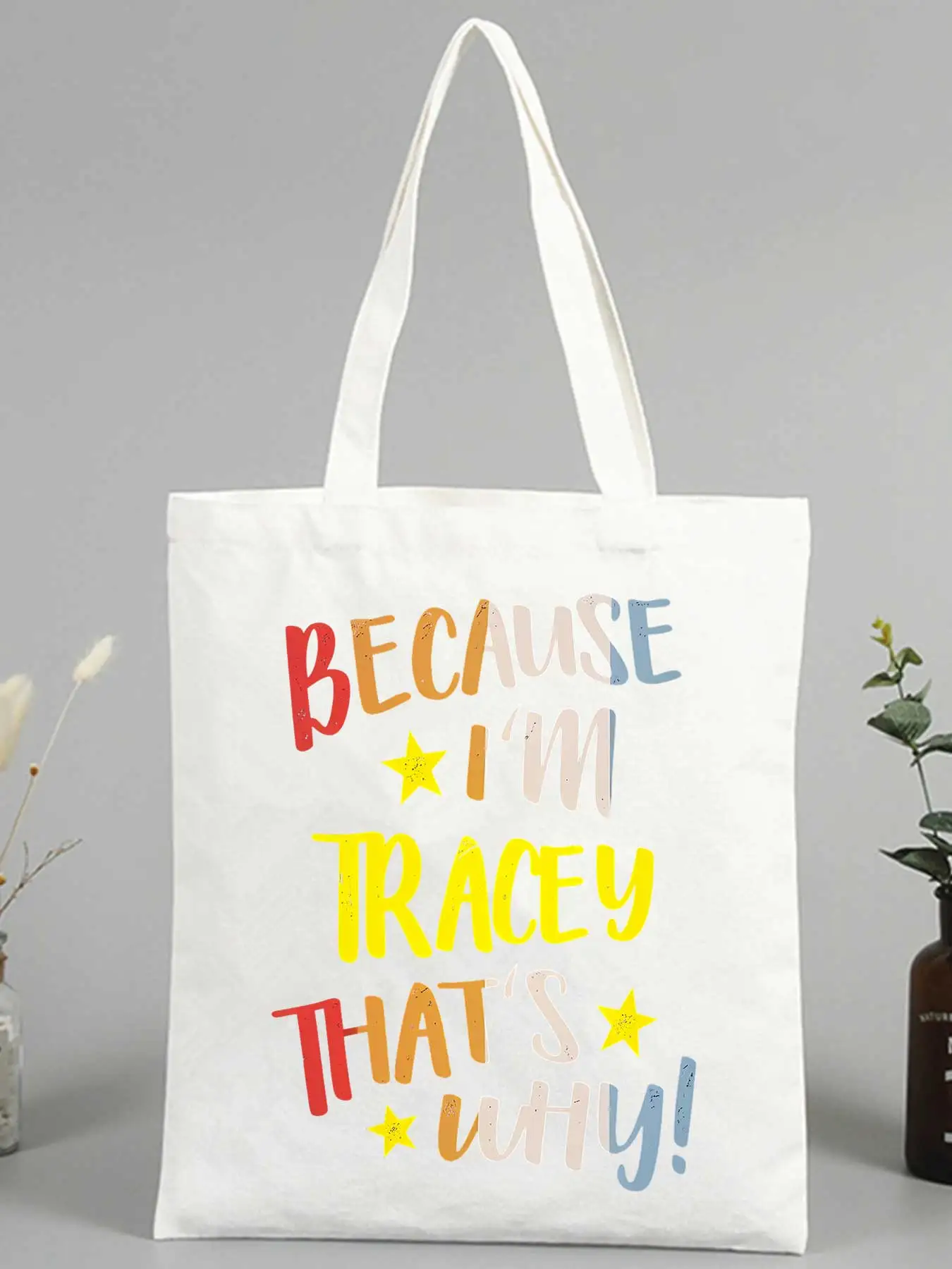 Women's canvas tote bag with colorful letter print, casual style for daily shopping and outings