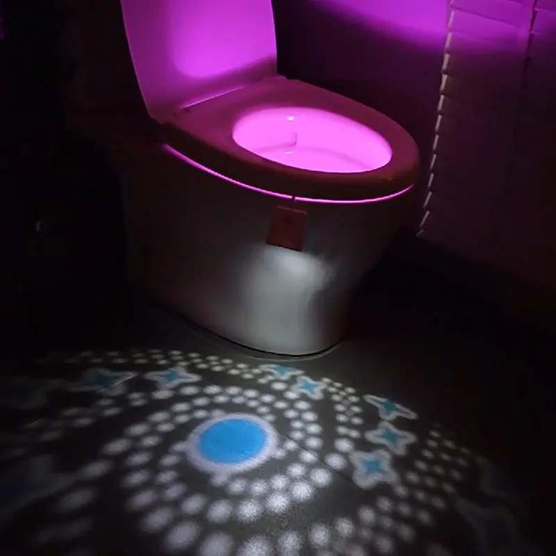 Luci notturne per WC, illuminazione per proiezione a ciotola a LED ricaricabile tramite USB con sensore di movimento, accessorio da bagno divertente e fantastico - Unico e F
