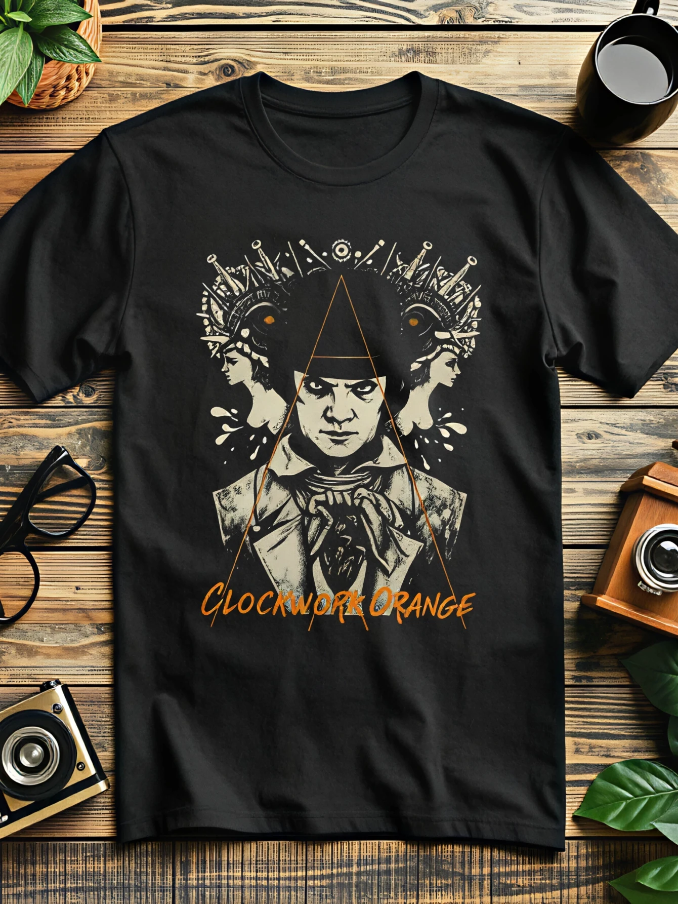 Men T-Shirt Clockwork Orange Character Portrait Graphic T-Shirt Geometric Eye Motif and Orange Handwritten Title Design