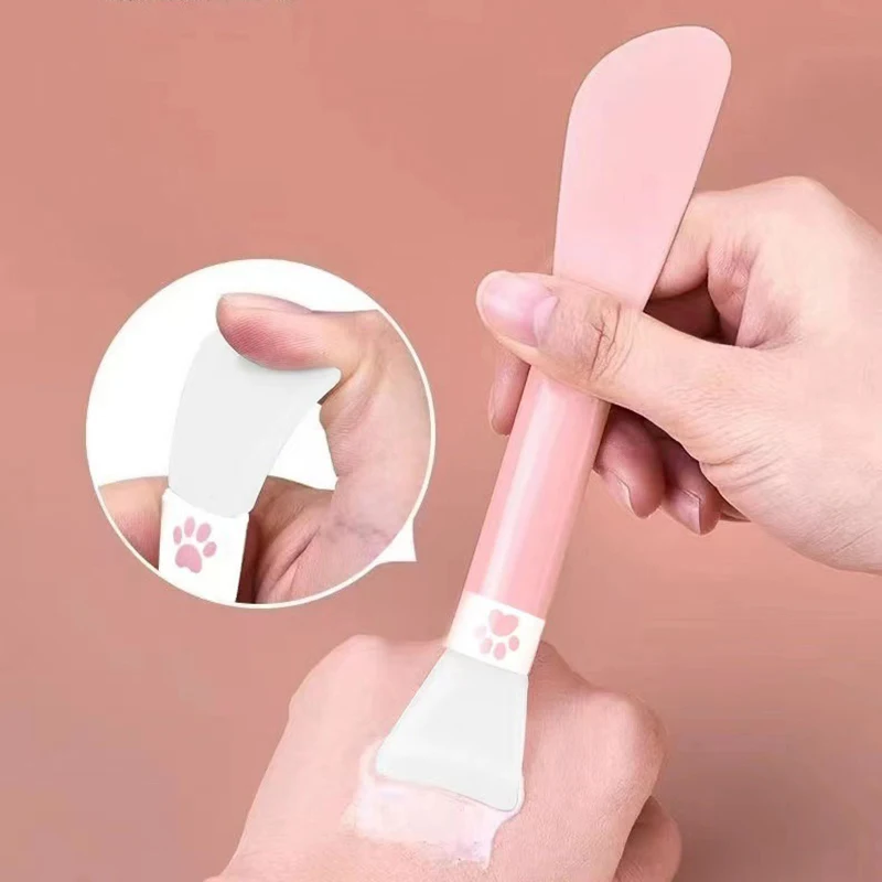 Niedliche Doppelkopf Silikon Gesichts maske Bürste 2 in 1 weichen Kopf mit Schaber integriert Dual-Use-Schlamm Rührstab DIY Beauty-Tool