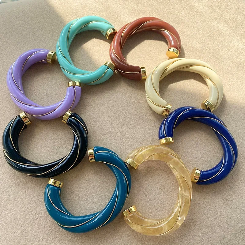 Gazing JewelryFrench niche design WOME fashion open bracelet, 585 gold dopamine gold-plated frame resin twist bracelet, high-end