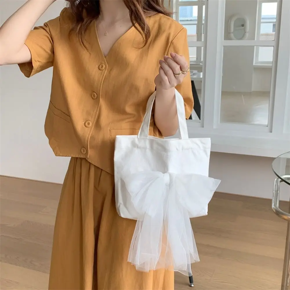 

Casual Ribbon Bow Handbag Fairy Large Capacity Mesh Tote Bag Korean Style Lunch Bag Canvas Tote Bag Travel