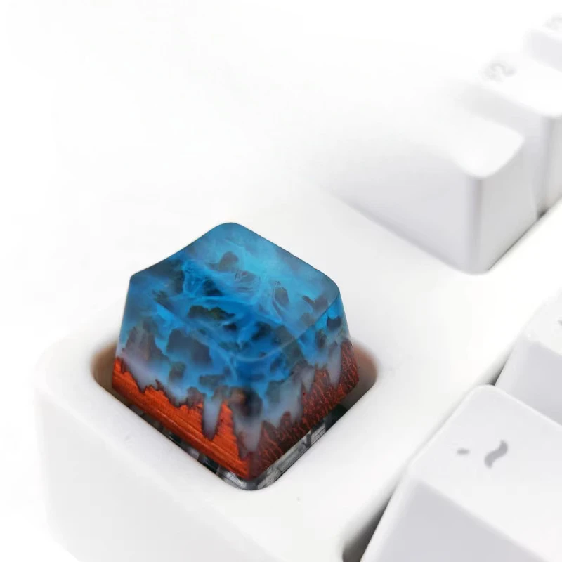 Luoxue Qianhan Ding Snow Mountain Teclado mecánico Creativo de una sola personalidad Transmisión de luz Resina tridimensional Ani