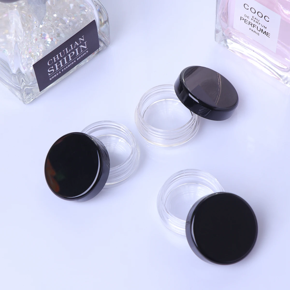 

50pcs Black Screw Cap Refillable Cream Containers Durable Mini Round Bottom Travel Bottles for Lotions Balms Ointments