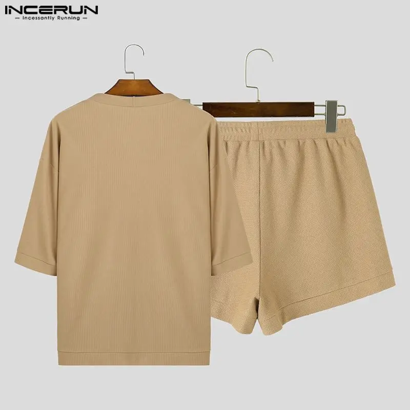 INCERUN-Conjunto de dos piezas para hombre, pantalones cortos de cárdigan de manga media, informales, ahuecados, de Color sólido, S-5XL, estilo