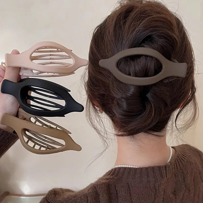 

Large Plastic Hair Claw Clip Matte Color Hair Clamps Grab Hollowed Oval Geometric Barrettes Hairpin Women Hair Accessories