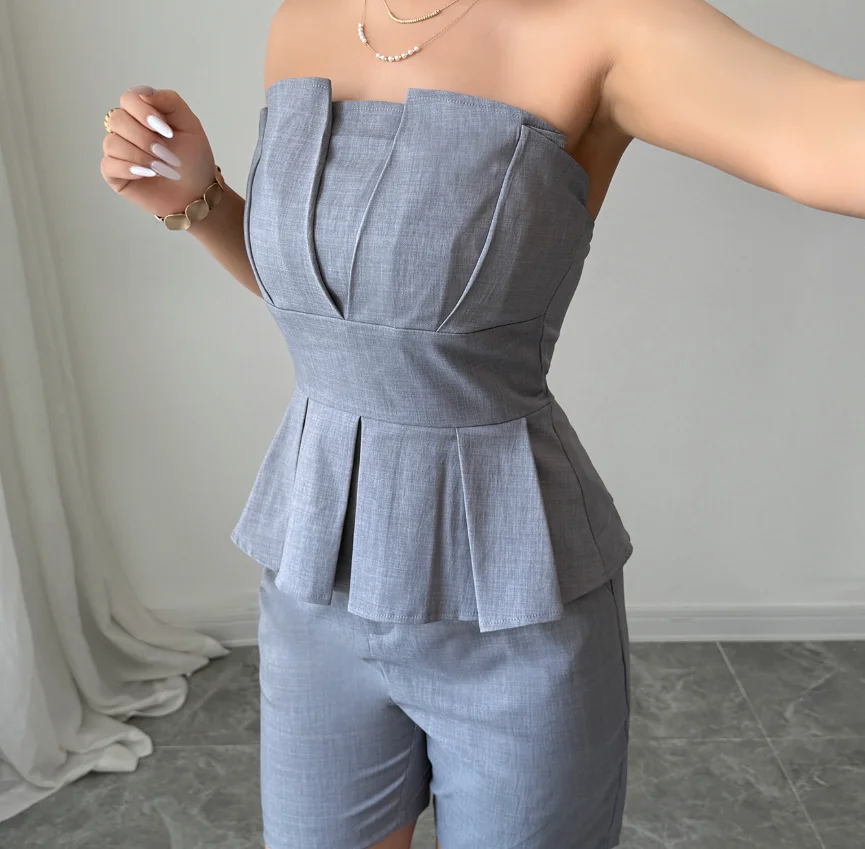 Tweedelige set damesoutfit 2025 zomer nieuwe effen kleur elegante bandeau rits terug ruches tank en hoge taille casual shorts set