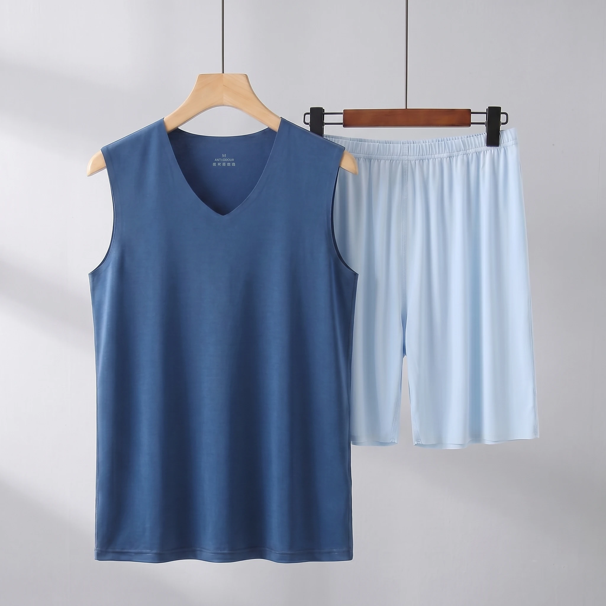 Dark blue vest + light blue shorts