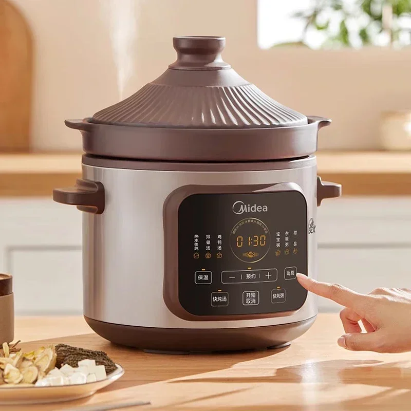 Midea สีม่วงหม้อสตูว์ไฟฟ้าหม้อใช้ในครัวเรือนอัตโนมัติเซรามิคซุปสตูว์ทําอาหารโจ๊กหม้อไฟฟ้า Stewpot