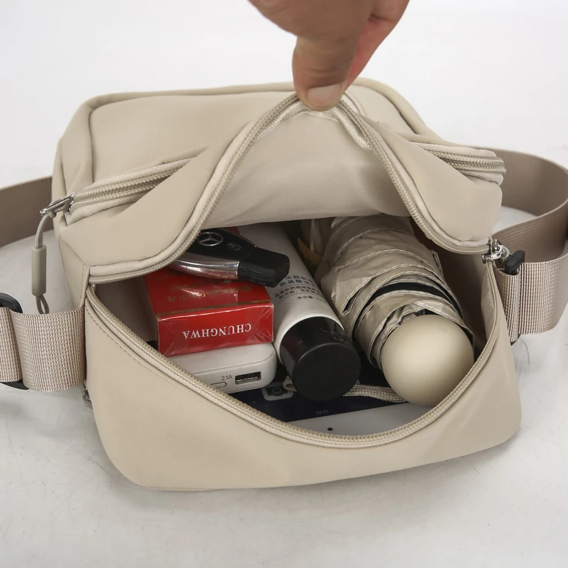 Herren-Umhängetasche aus Nylon, lässige Pendler-Outdoor-Mode-Schultertasche, wasserdichter Rucksack im Street-Style, einfarbig – Detail 21