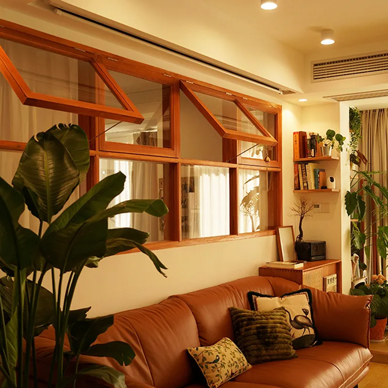 Log glass, sliding wooden doors and windows push through the interior living room