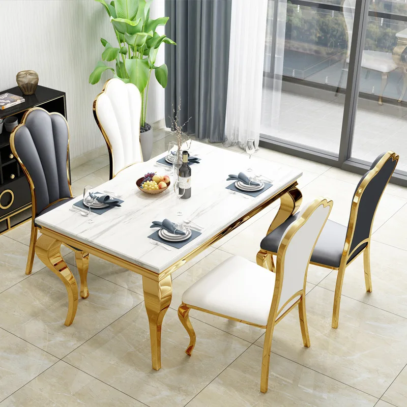 

Postmodern light luxury marble dining table and chair combination set Nordic creative stainless steel table high-end