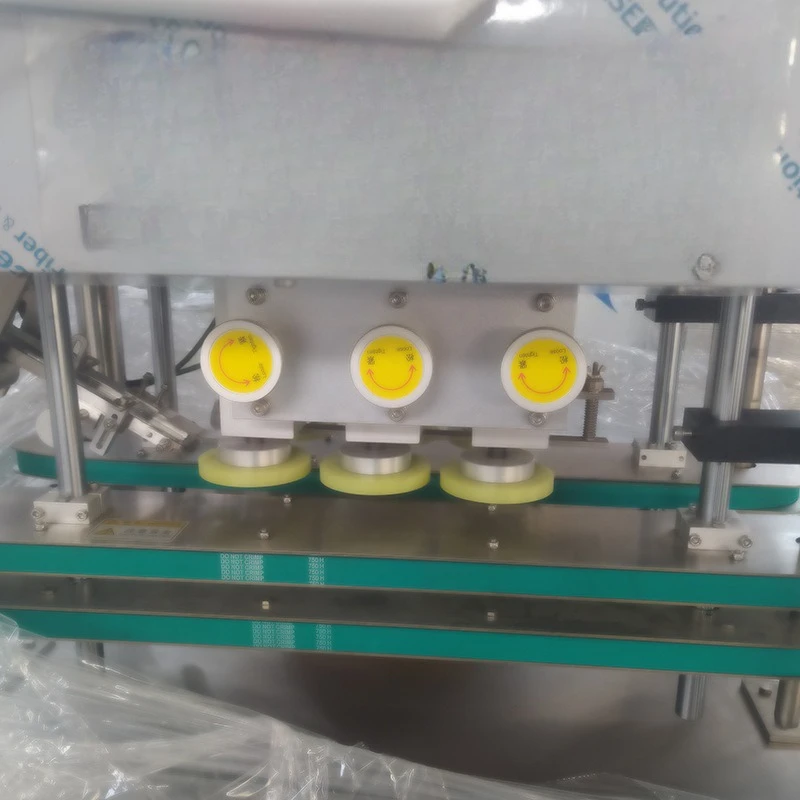 Manufacturer's automatic round bottle square bottle plastic cap six-wheel cap rubbing machine automatic lid hanging horse mouth