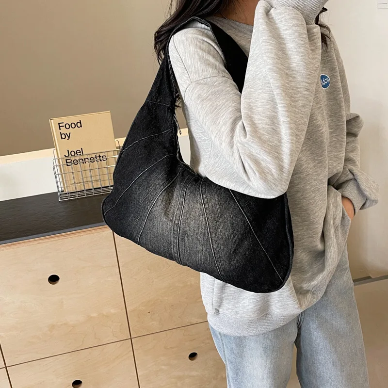

Fashion texture Korean version of the popular denim shoulder bag Spice Girls niche casual commuting armpit female bags