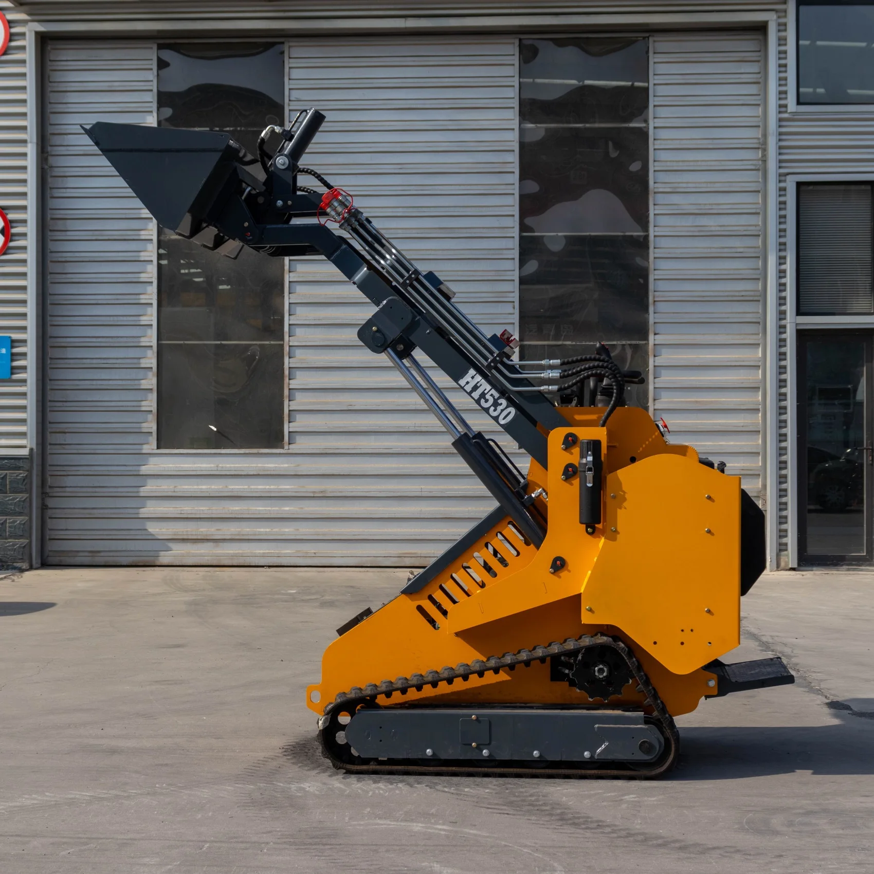 Dostosowany, wielofunkcyjny (4 w 1) ładowarka odkładająca koła, z napędem diesla, na gąsienicach, dostępna w magazynie w USA.