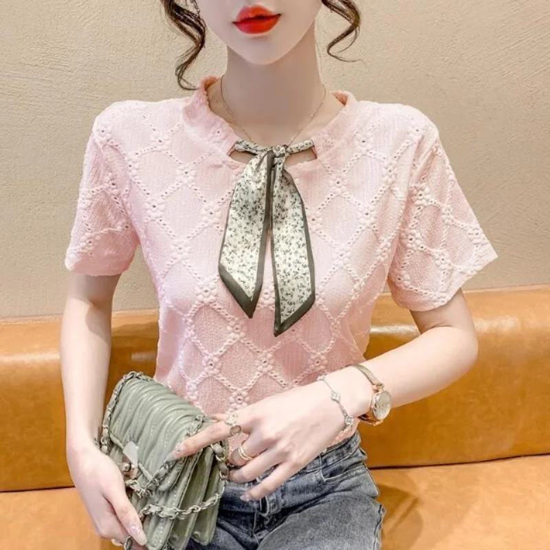 2023 Summer Fashion Korean Edition Round Neck Lace Up Reduced Age Lace Hollow Jacquard Short Sleeve Women\'s Solid Color Shirt