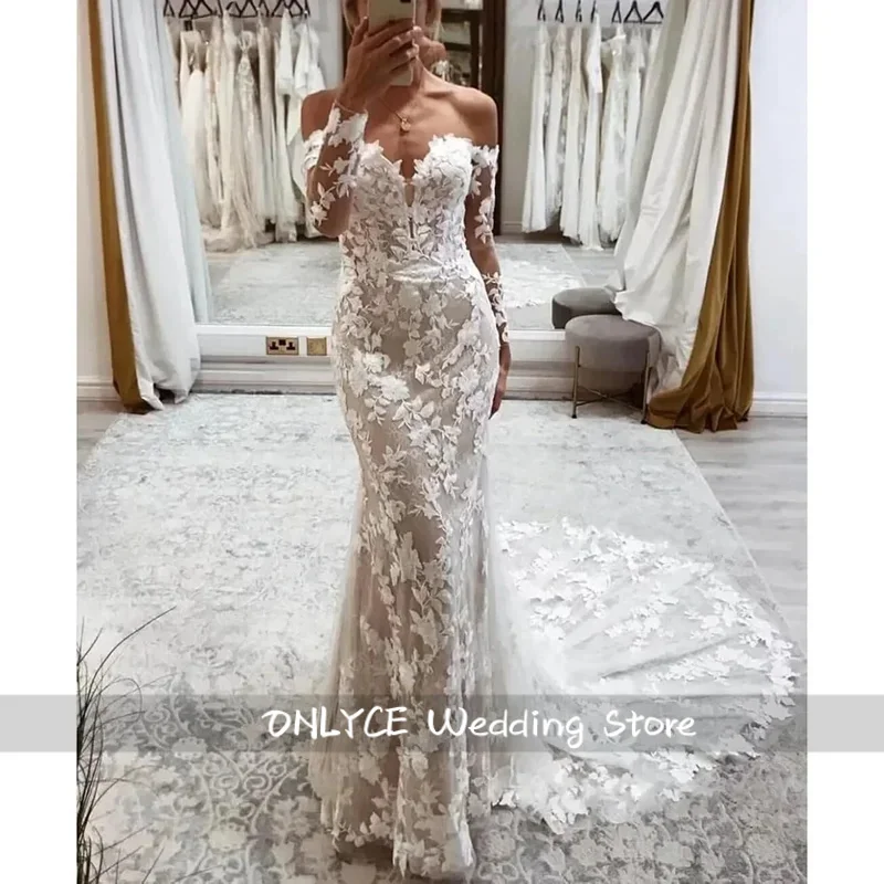 Suknia ślubna na zamówienie, luksusowa, z długim rękawem, szyfonowa, tiulowa, w stylu boho, z koronkowymi aplikacjami.