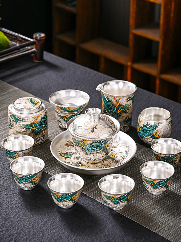 

High-grade silver tea set 999 sterling silver painting hand relief teapot lid bowl assembly kung fu tea set