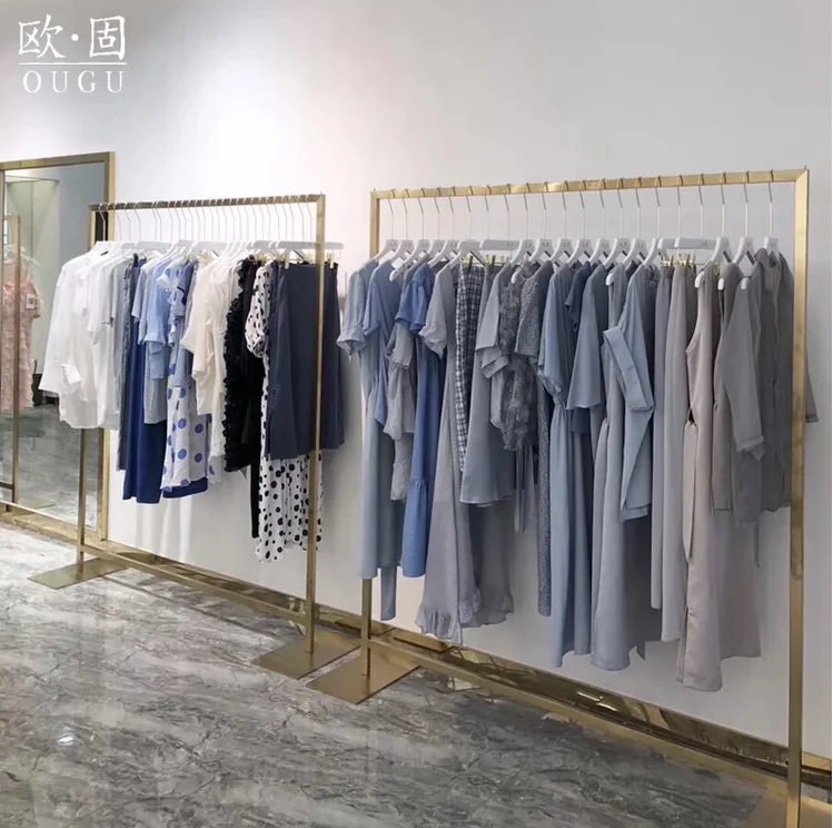 

High end clothing store display rack women's clothing store titanium gold stainless steel landing wall Island hanger