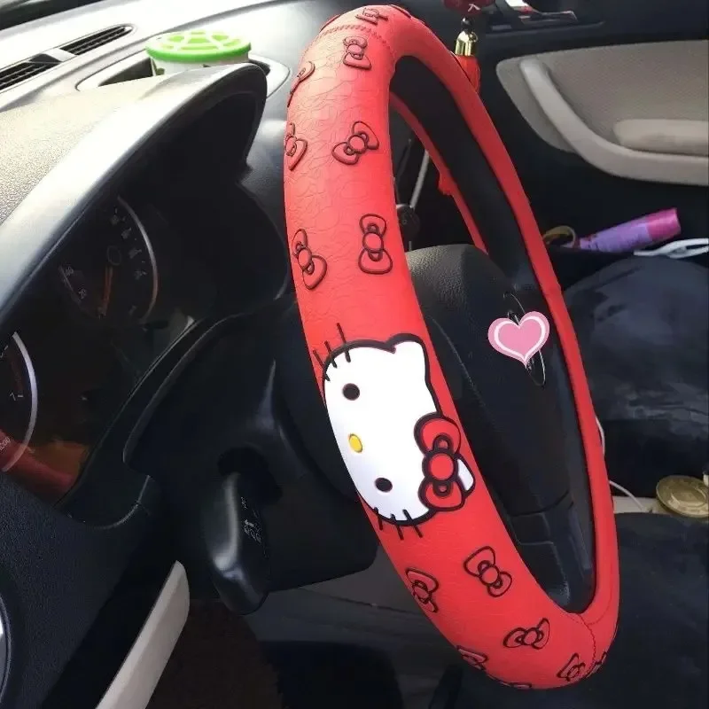 Hello Kitty kawaii cartoon car uchwyty kierownicy uroczy kreatywny spersonalizowany fartuch osłona na kierownicę do samochodu prezent świąteczny sprzedaż hurtowa