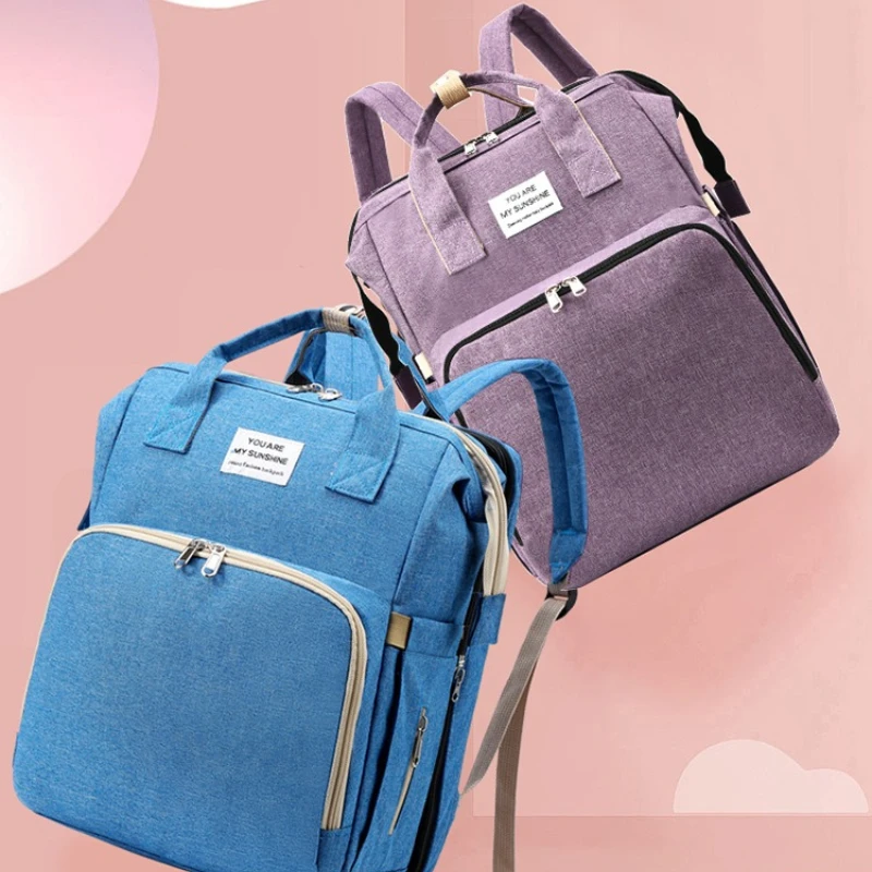 

Многофункциональная сумка для мамы: дорожный спальный коврик, вместительная сумка для сна, складной и трансформируемый рюкзак для подгузников