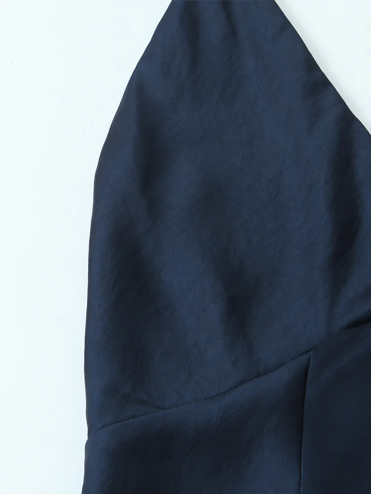 Nueva moda femenina de estilo europeo, vestido largo versátil y elegante de color sólido con cuello en V y tirantes finos con textura satinada de seda.