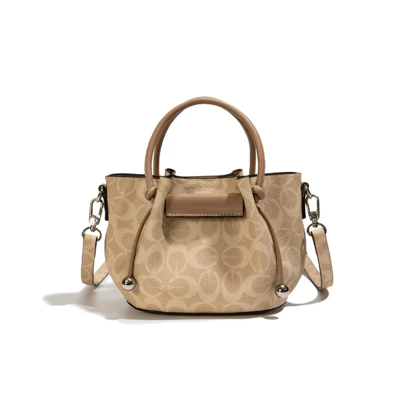 

Light luxury niche design 2026 new water bucket versatile shoulder bag crossbody bag for women