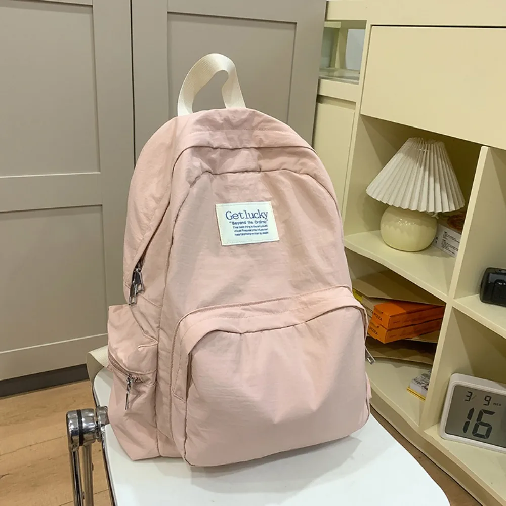 

Simple Lightweight Travel Backpack Korean Style Nylon Solid Color Backpack Large Capacity Waterproof Student Schoolbag Teenagers